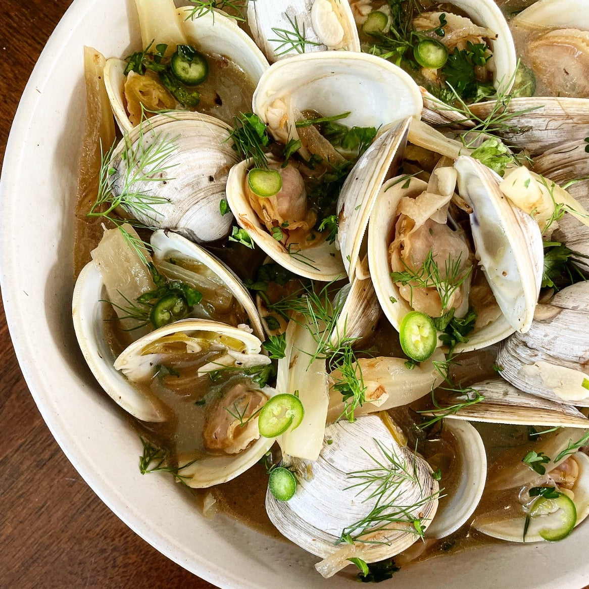 <i>Cooking with Nomadica</i> — Clams, fennel, white wine + serrano butter